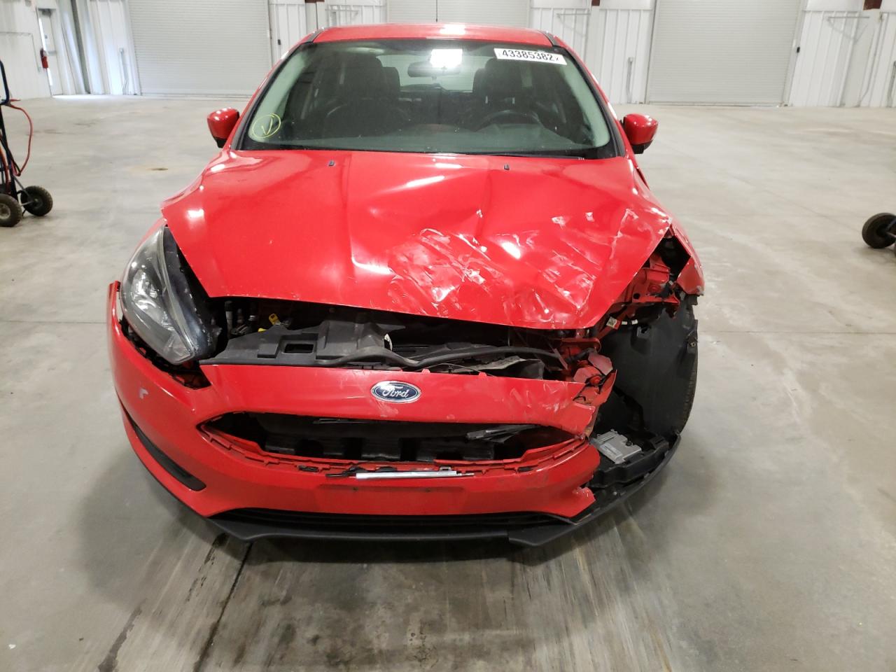 Foto 9 de la subasta – 2015 FORD FOCUS SE con VIN 1FADP3K24FL302689
