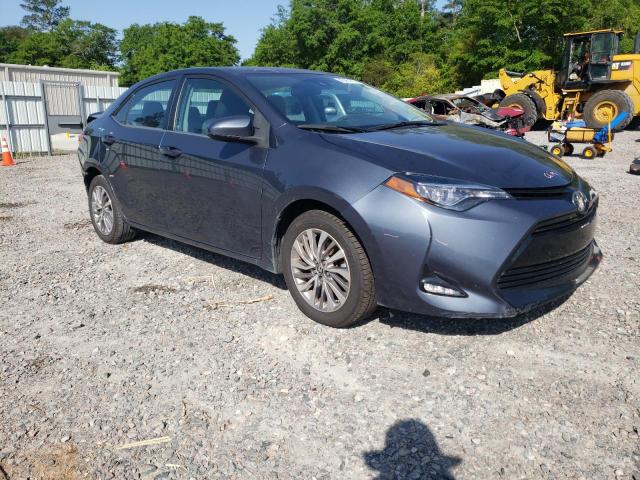 TOYOTA COROLLA LE 2017 with VIN 2T1BPRHE3HC899107 - Photo from auction