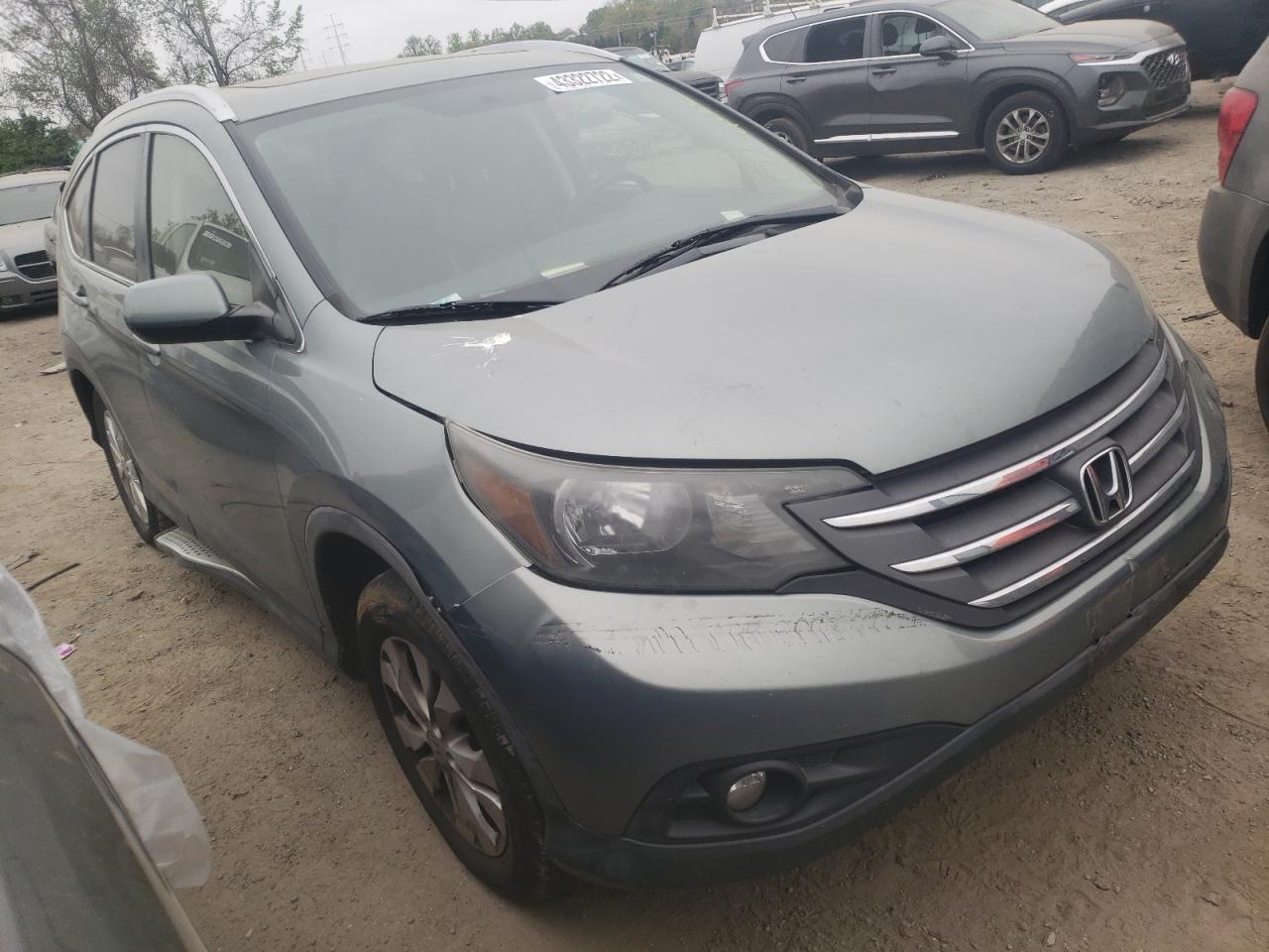 HONDA CR-V EXL 2012 with VIN JHLRM4H77CC007554 - Photo from auction