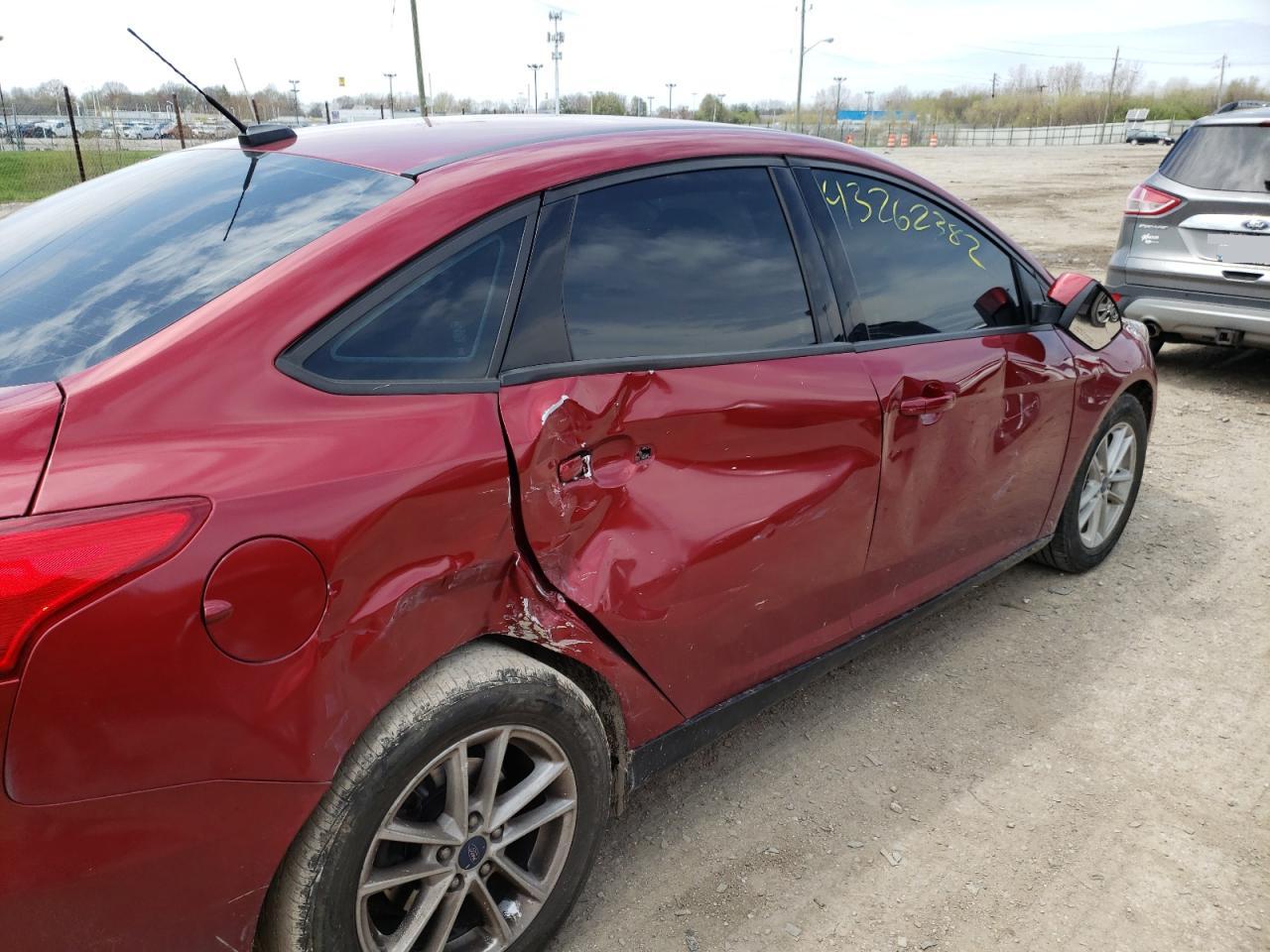 Photo 9 from auction – 2017 FORD FOCUS SE with VIN 1FADP3FE0HL309856