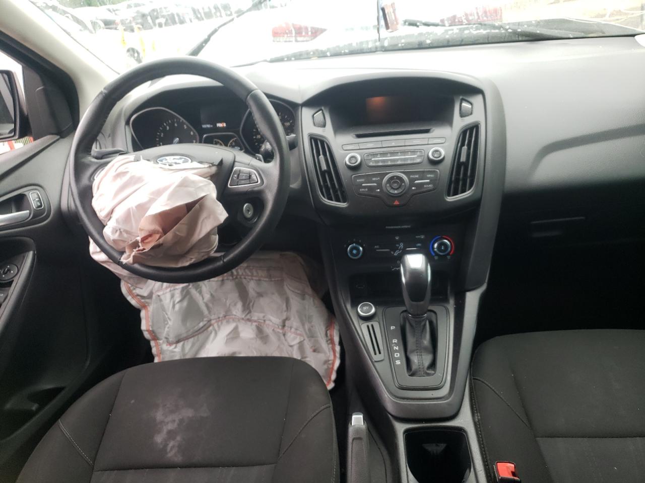 Photo 9 from auction – 2015 FORD FOCUS SE with VIN 1FADP3F20FL338521