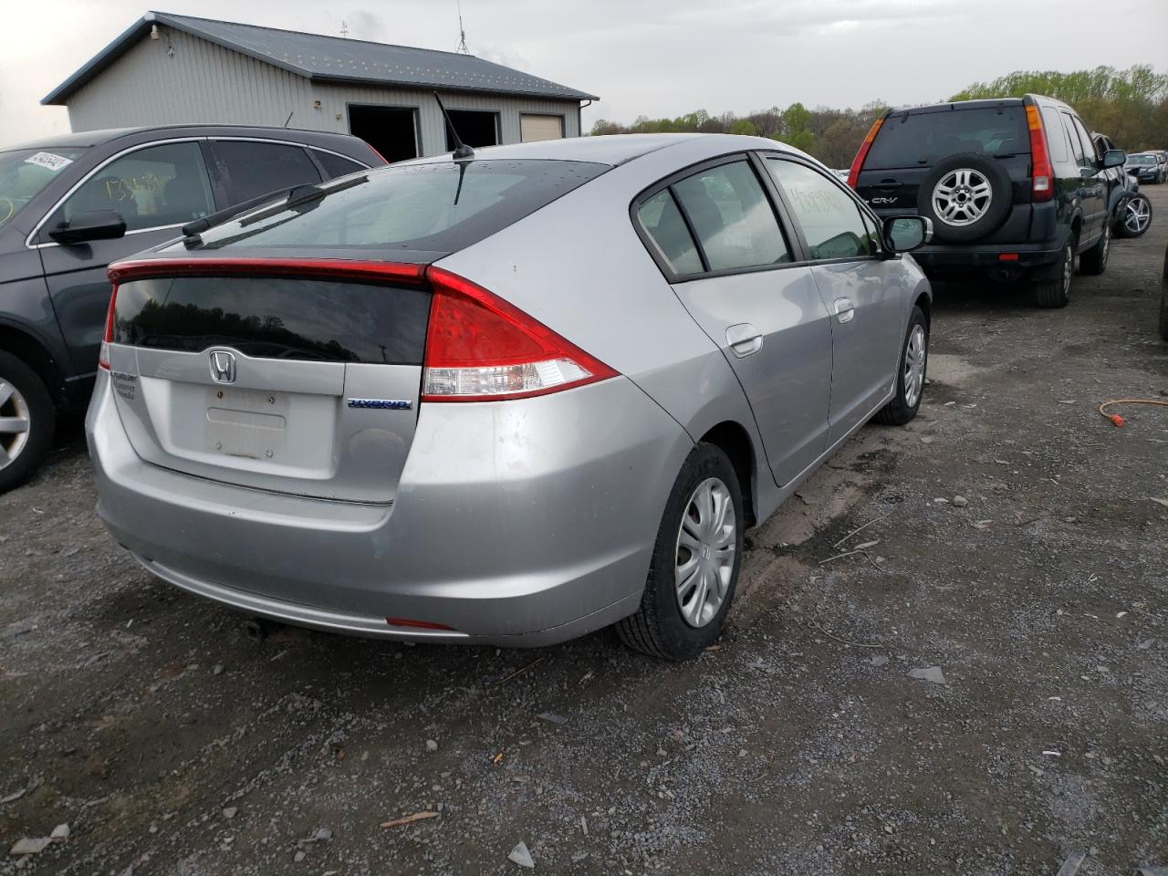 Photo 4 from auction – 2011 HONDA INSIGHT LX with VIN JHMZE2H55BS011697