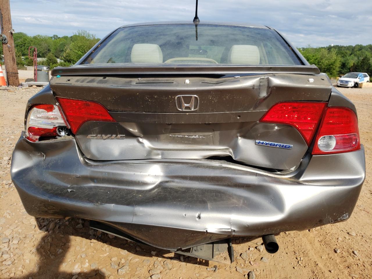 Photo 9 from auction – 2006 HONDA CIVIC HYBR with VIN JHMFA36216S007066