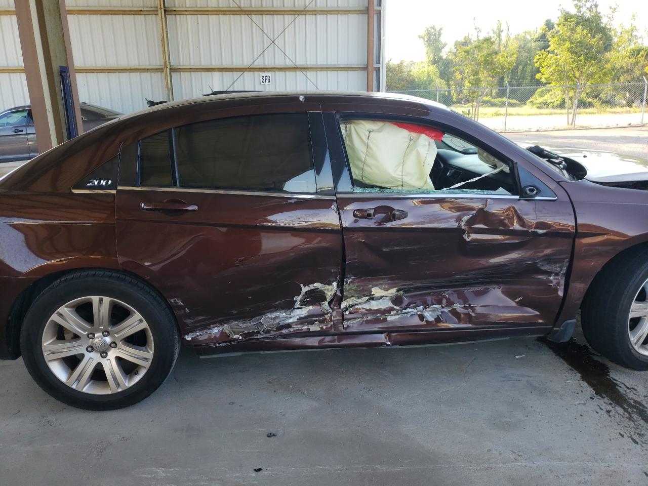 Photo 9 from auction – 2012 CHRYSLER 200 TOURIN with VIN 1C3CCBBG9CN169469
