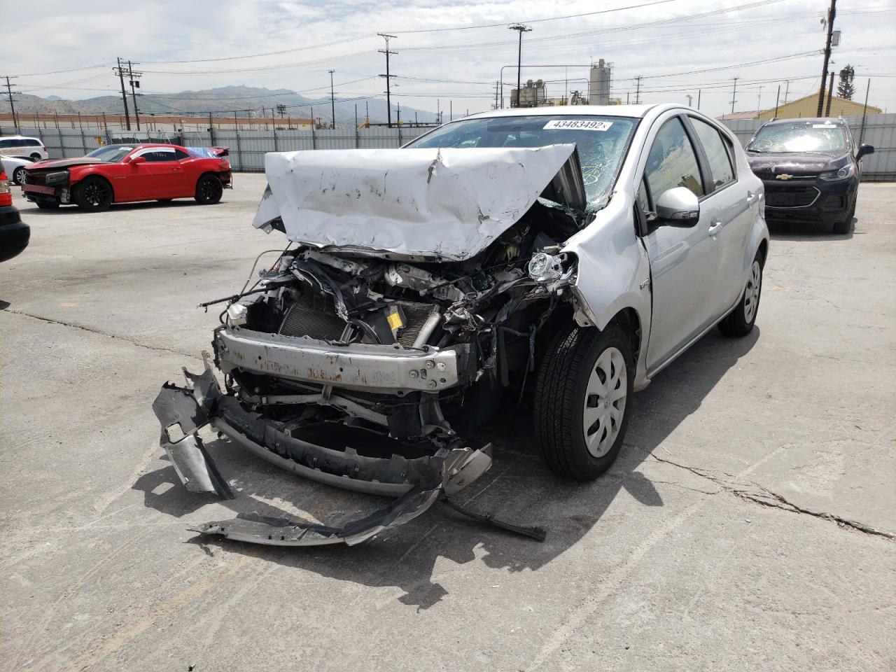 Photo 2 from auction – 2013 TOYOTA PRIUS C with VIN JTDKDTB39D1554109