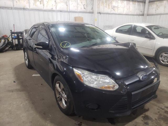 FORD FOCUS SE 2014 with VIN 1FADP3F21EL198574 - Photo from auction