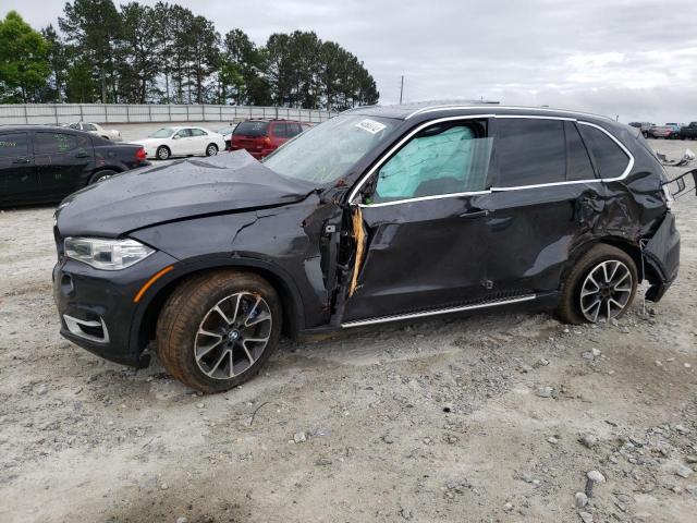 Photo 9 from auction – 2014 BMW X5 XDRIVE5 with VIN 5UXKR6C55E0C02608