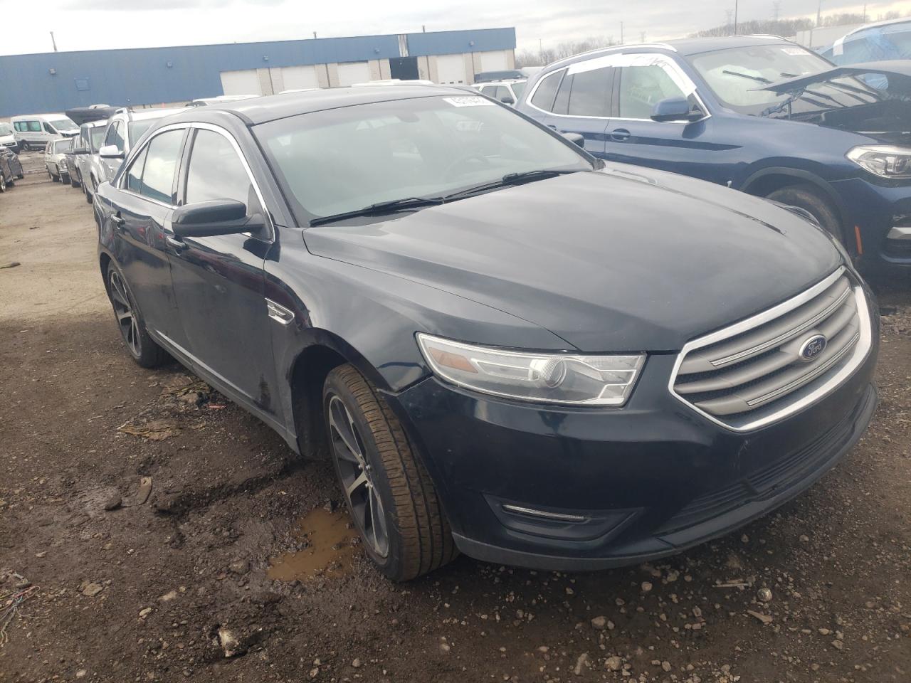 FORD TAURUS SEL 2014 with VIN 1FAHP2E89EG129030 - Photo from auction