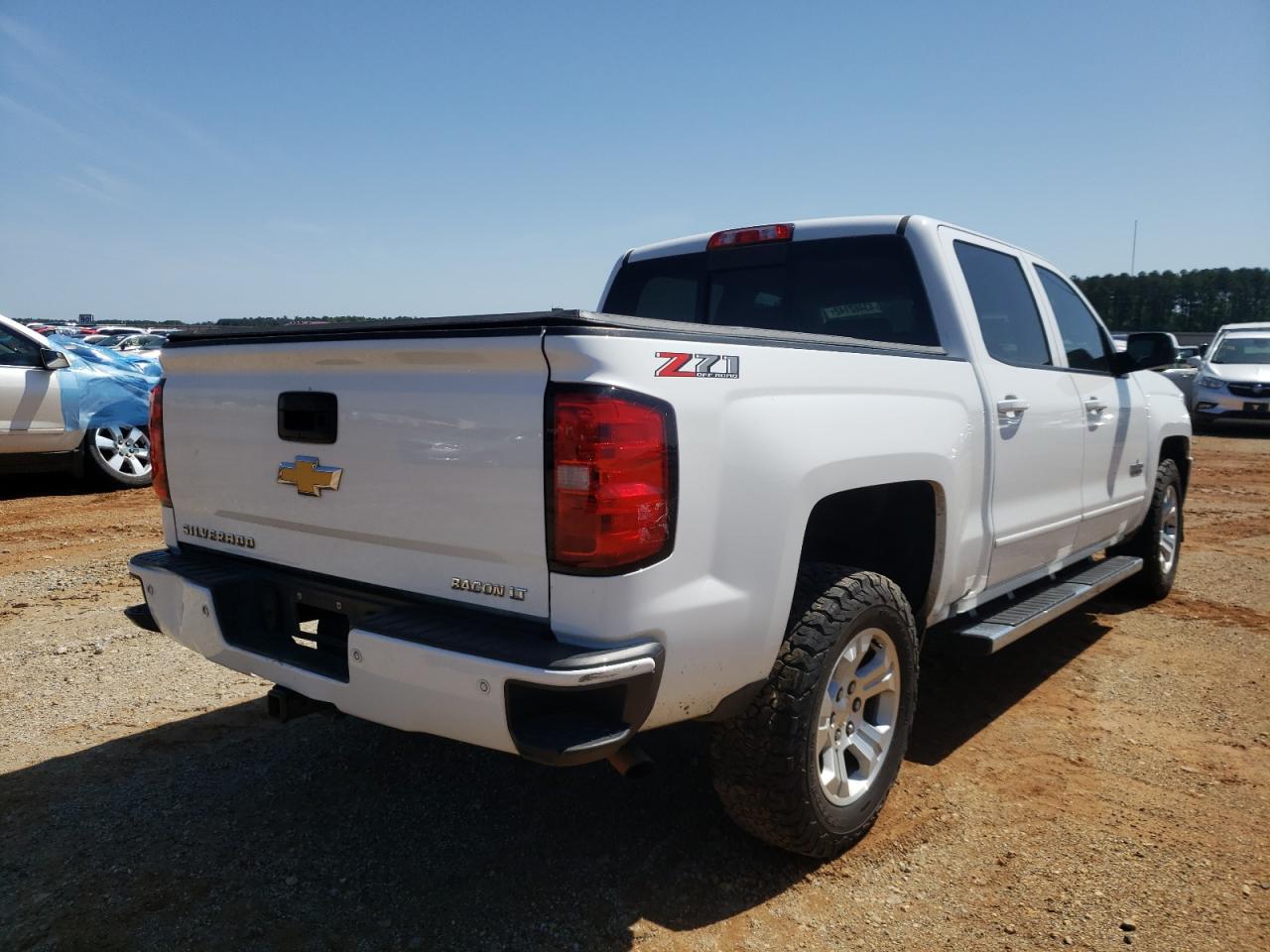 Photo 4 from auction – 2018 CHEVROLET SILVERADO with VIN 3GCUKREC8JG617419