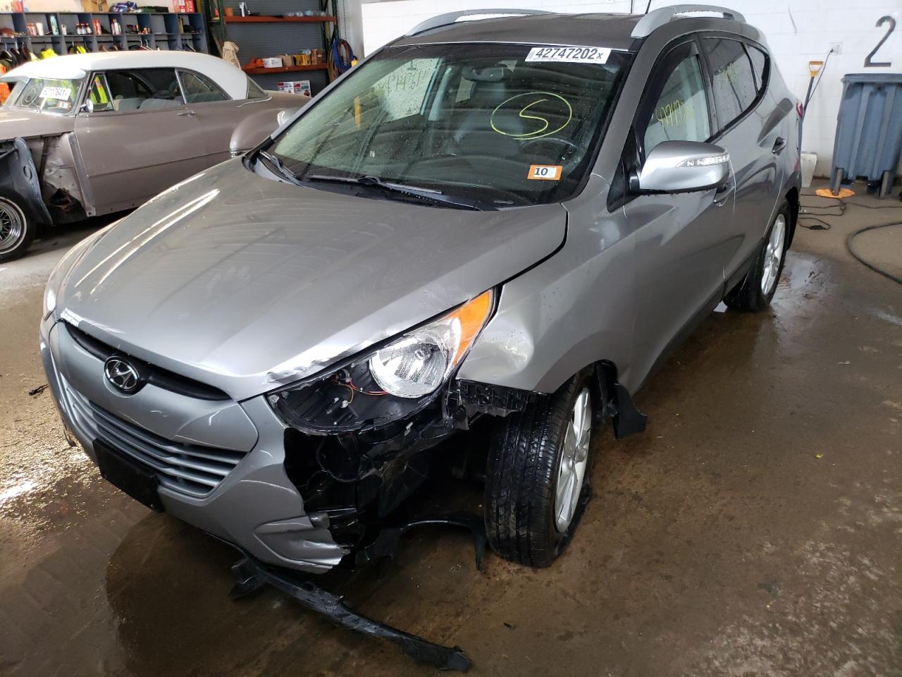 Photo 2 from auction – 2012 HYUNDAI TUCSON GLS with VIN KM8JUCAC3CU374677