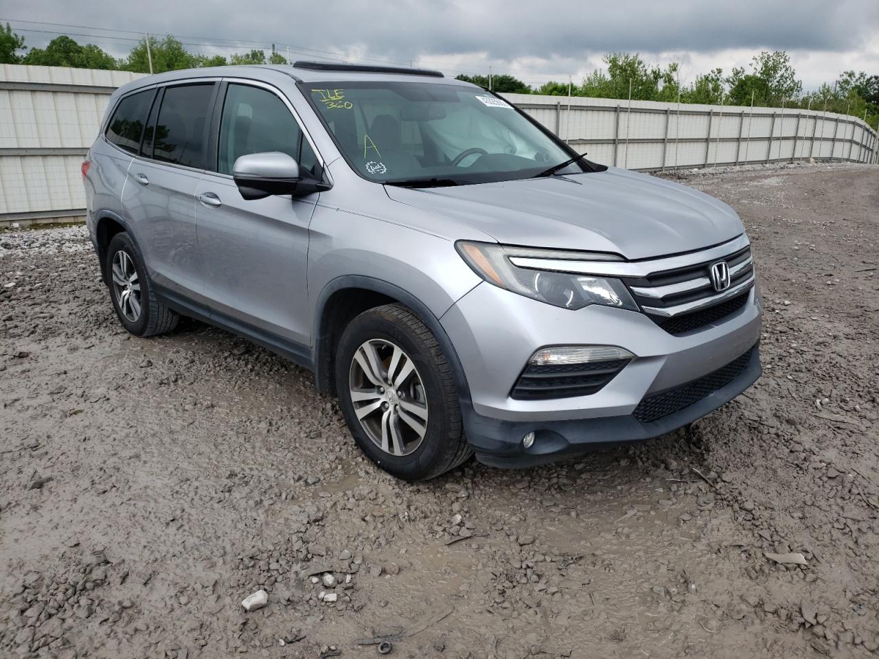 HONDA PILOT EXLN 2016 with VIN 5FNYF6H7XGB073734 - Photo from auction