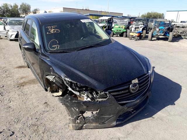 MAZDA CX-5 GT 2016 with VIN JM3KE2DY0G0847124 - Photo from auction