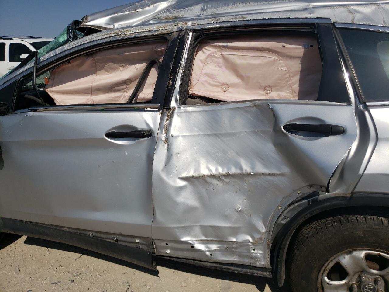 Photo 10 from auction – 2014 HONDA CR-V LX with VIN 5J6RM4H38EL076549