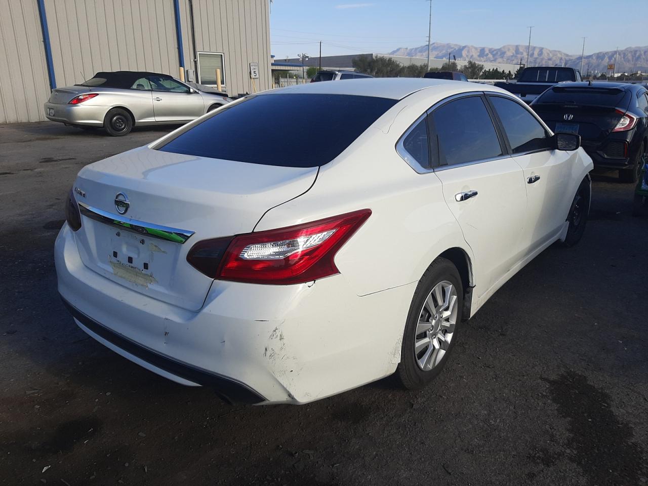 Photo 4 from auction – 2016 NISSAN ALTIMA 2.5 with VIN 1N4AL3AP2GC180590