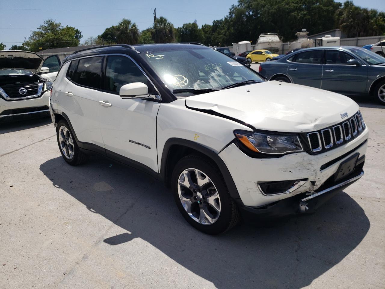 JEEP COMPASS 2019 with VIN 3C4NJCCB0KT749002 - Photo from auction