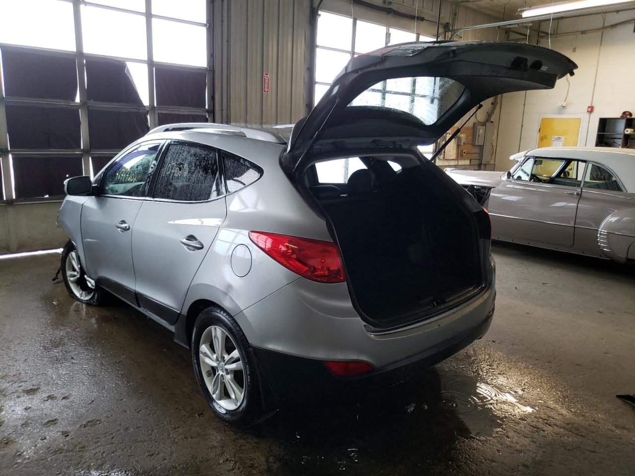 Photo 3 from auction – 2012 HYUNDAI TUCSON GLS with VIN KM8JUCAC3CU374677