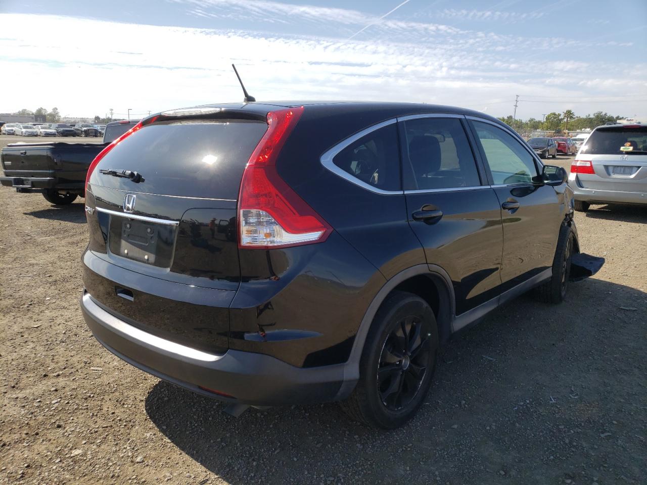 Photo 4 from auction – 2014 HONDA CR-V EX with VIN 2HKRM3H52EH546595