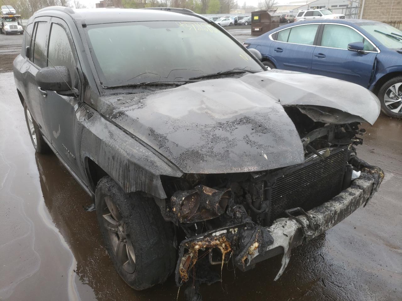 JEEP COMPASS LA 2014 with VIN 1C4NJDEB0ED708642 - Photo from auction