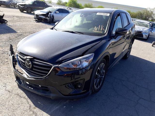 Photo 2 from auction – 2016 MAZDA CX-5 GT with VIN JM3KE2DY0G0847124