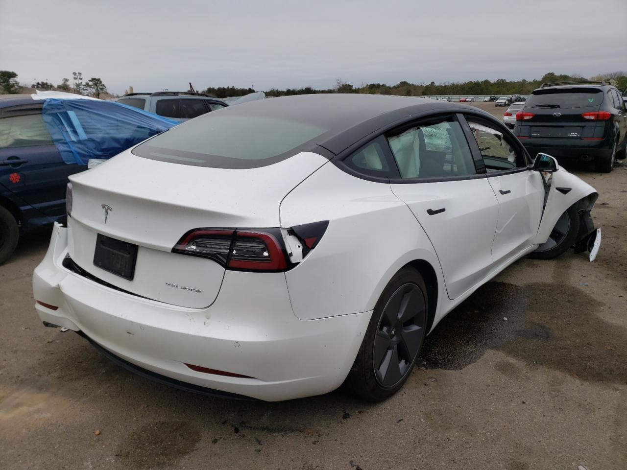 Photo 4 from auction – 2021 TESLA MODEL 3 with VIN 5YJ3E1EB1MF924744