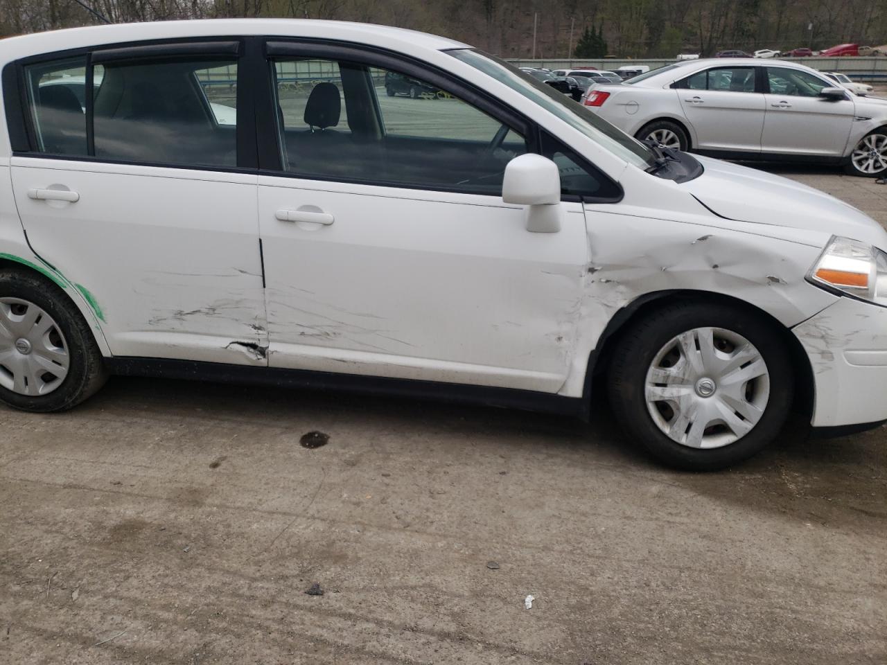 Photo 9 from auction – 2011 NISSAN VERSA S with VIN 3N1BC1CP4BL431142
