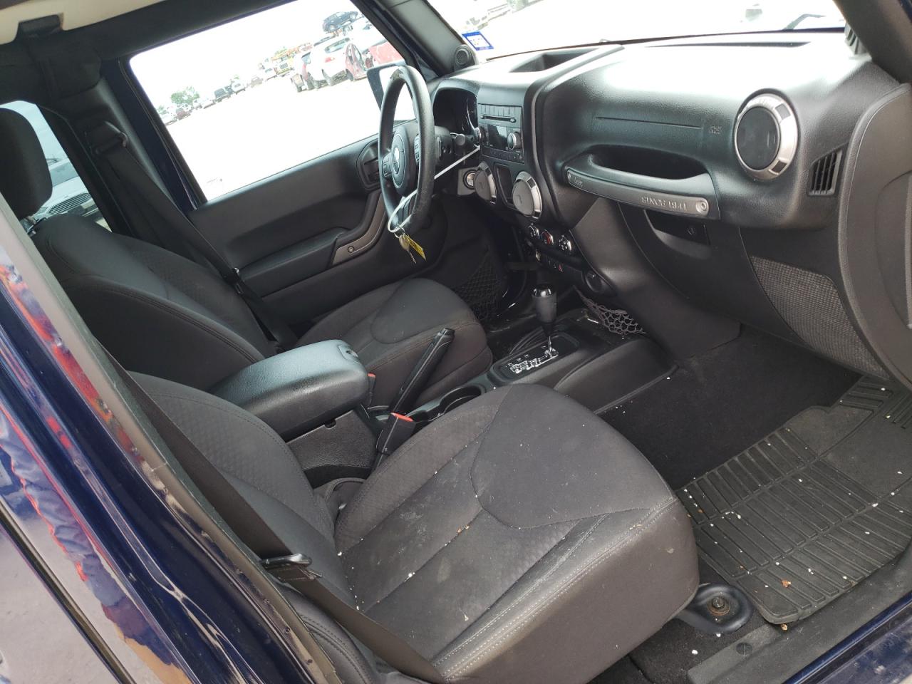 Photo 5 from auction – 2013 JEEP WRANGLER U with VIN 1C4BJWDG2DL632390