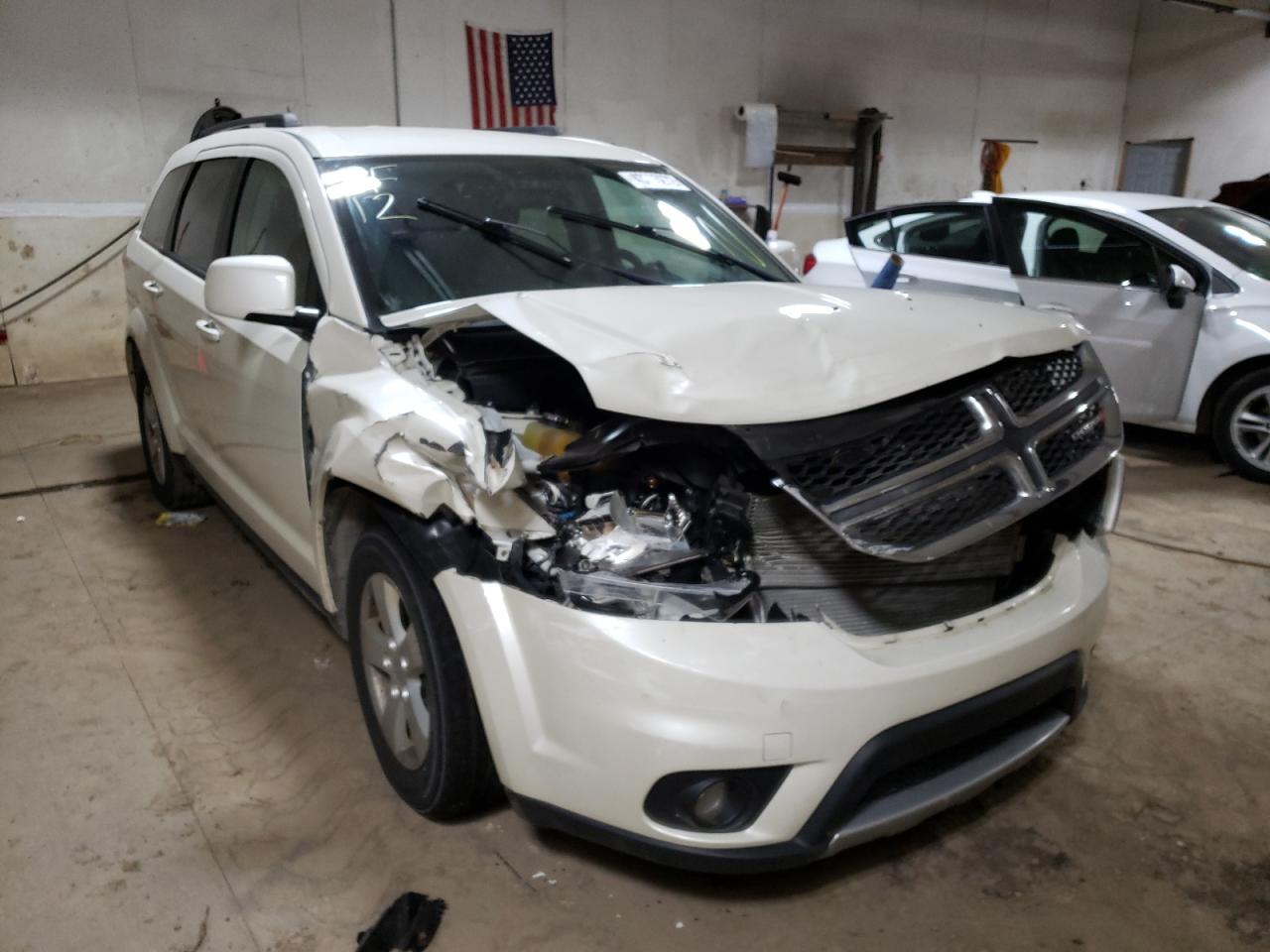 DODGE JOURNEY SX 2012 with VIN 3C4PDDBG4CT297477 - Photo from auction