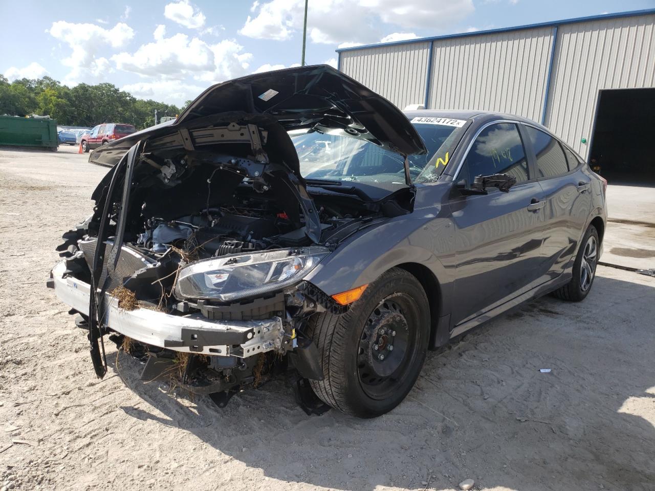 Photo 2 from auction – 2021 HONDA CIVIC LX with VIN 2HGFC2F6XMH551306