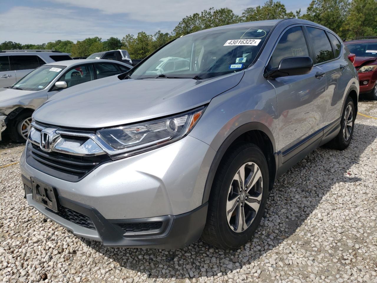 Photo 2 from auction – 2017 HONDA CR-V LX with VIN 7FARW5H36HE010003