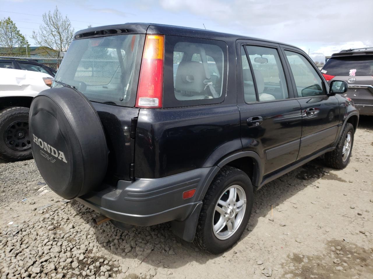 Photo 4 from auction – 1999 HONDA CR-V EX with VIN JHLRD1863XC063504
