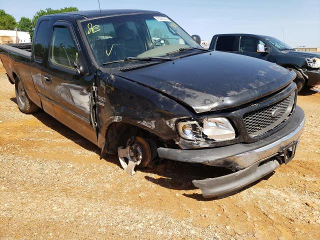 Photo 9 from auction – 2002 FORD F150 with VIN 1FTRX17W72NA24658