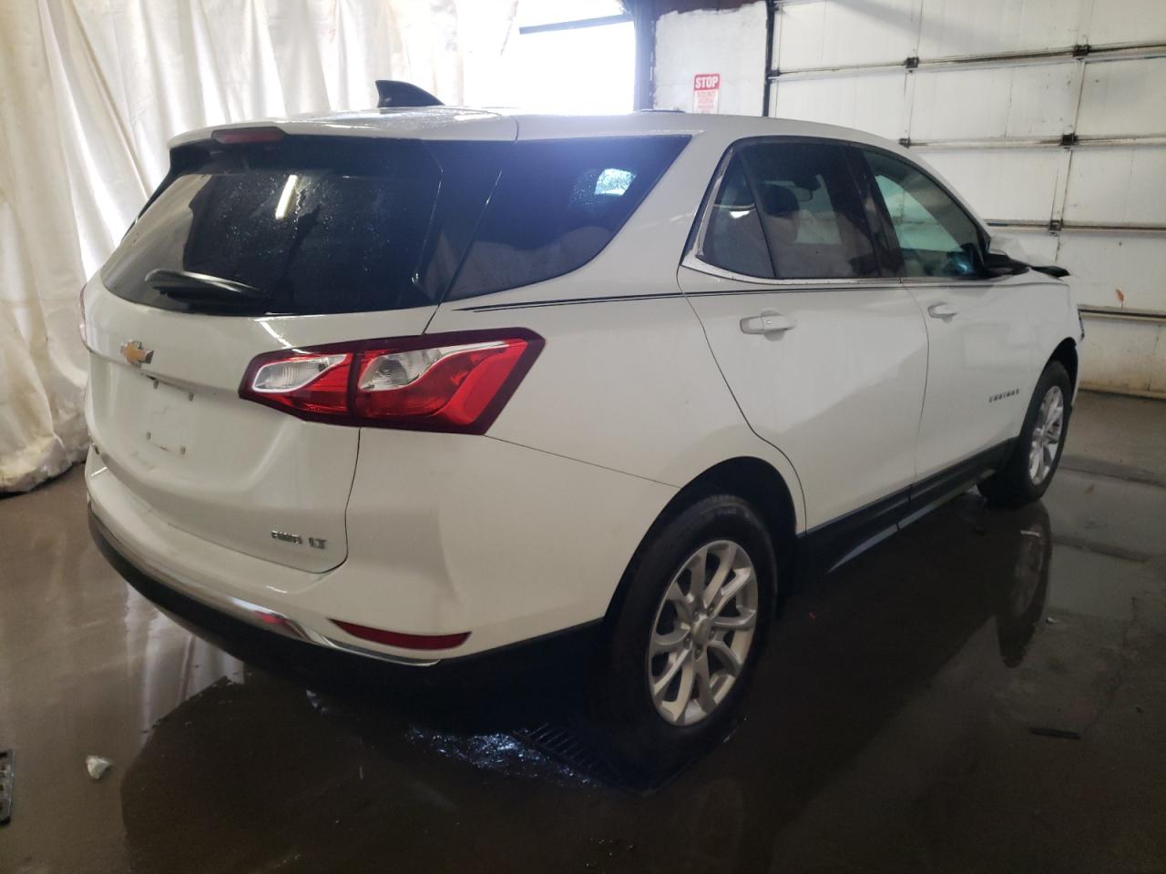 Photo 4 from auction – 2018 CHEVROLET EQUINOX LT with VIN 3GNAXSEV3JS620620