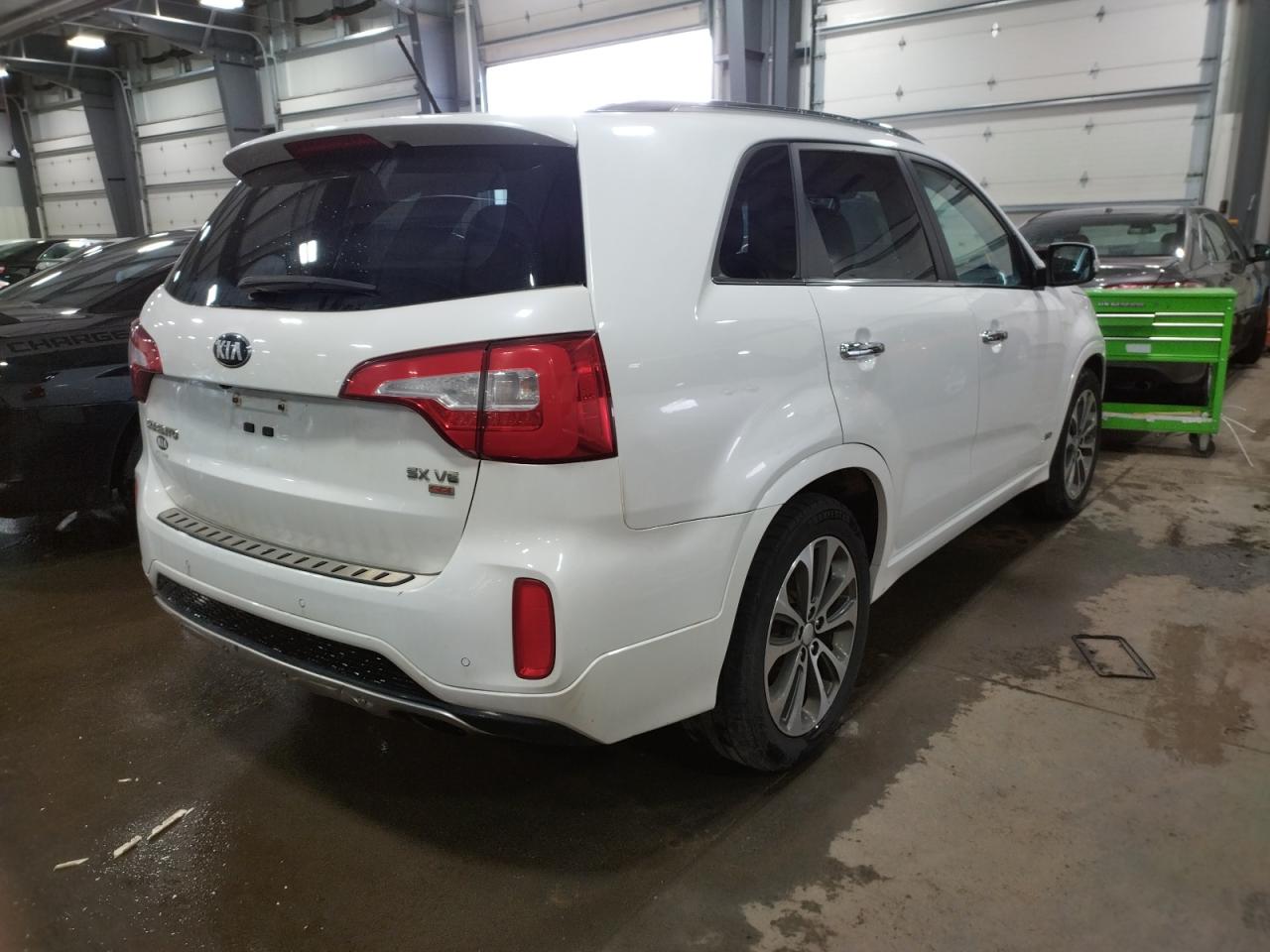 Photo 16 from auction – 2014 KIA SORENTO SX with VIN 5XYKWDA70EG529332