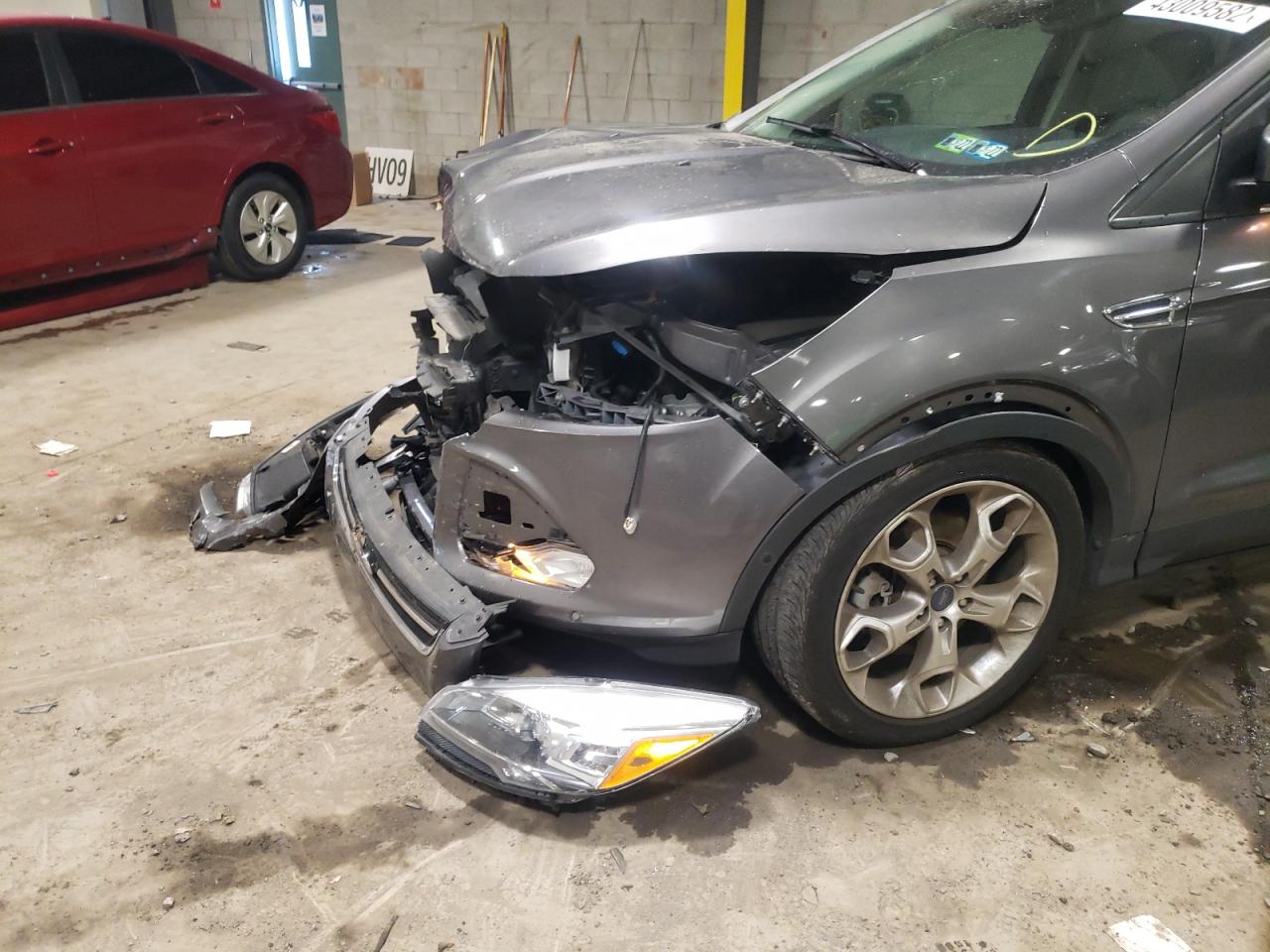 Photo 9 from auction – 2014 FORD ESCAPE TIT with VIN 1FMCU9JX7EUA90096