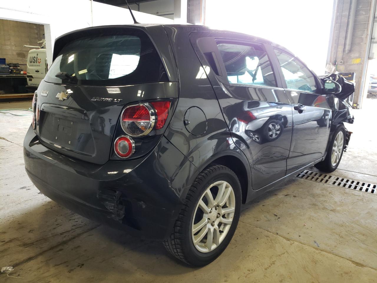 Photo 4 from auction – 2014 CHEVROLET SONIC LT with VIN 1G1JC6SH5E4121892