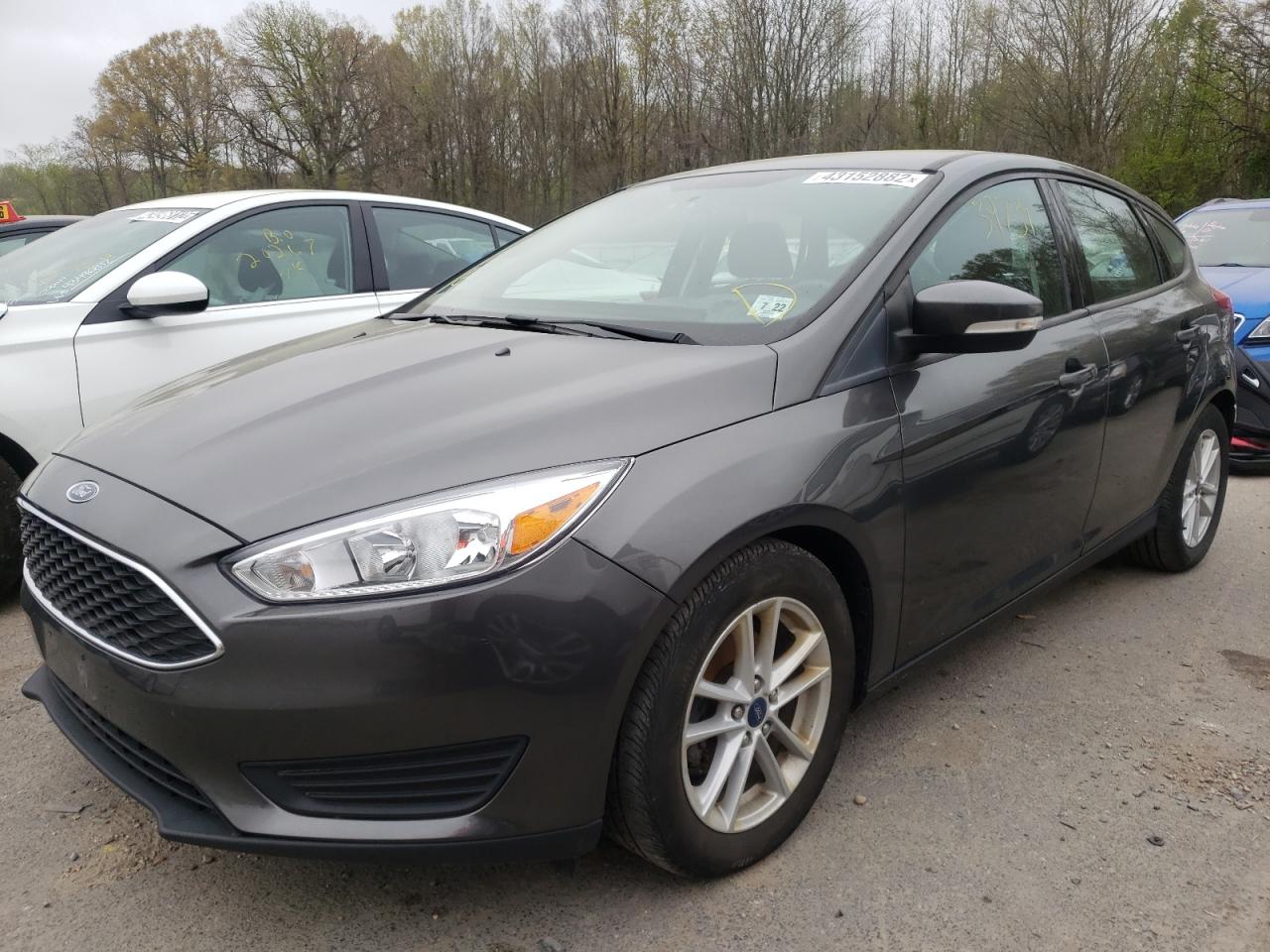 Photo 2 from auction – 2018 FORD FOCUS SE with VIN 1FADP3K29JL242577