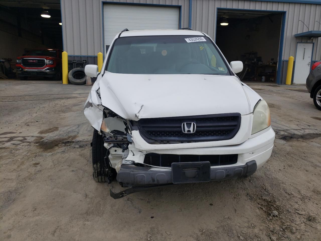 Photo 9 from auction – 2004 HONDA PILOT EXL with VIN 2HKYF185X4H526989