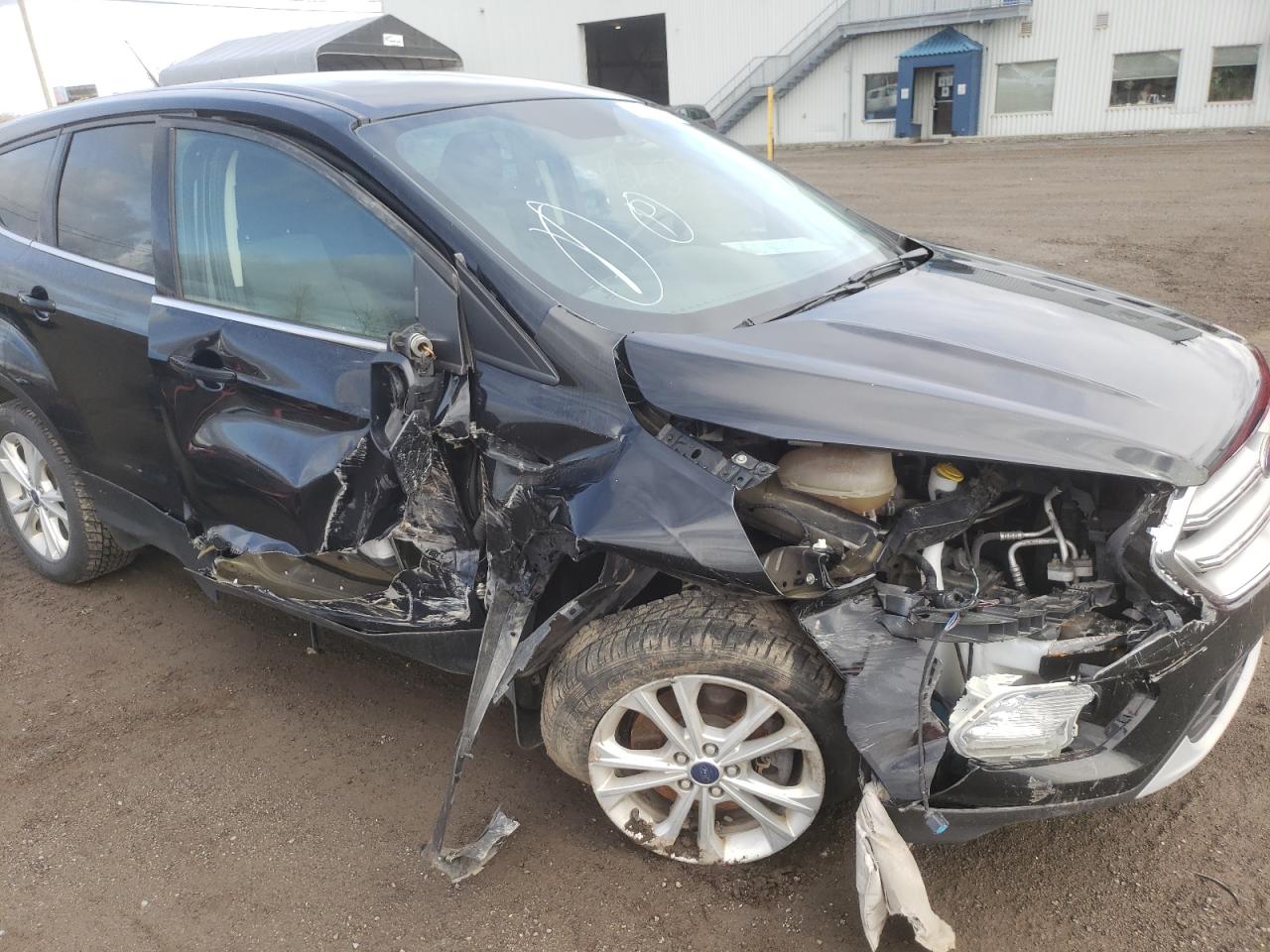 Photo 9 from auction – 2017 FORD ESCAPE SE with VIN 1FMCU0G9XHUB69464