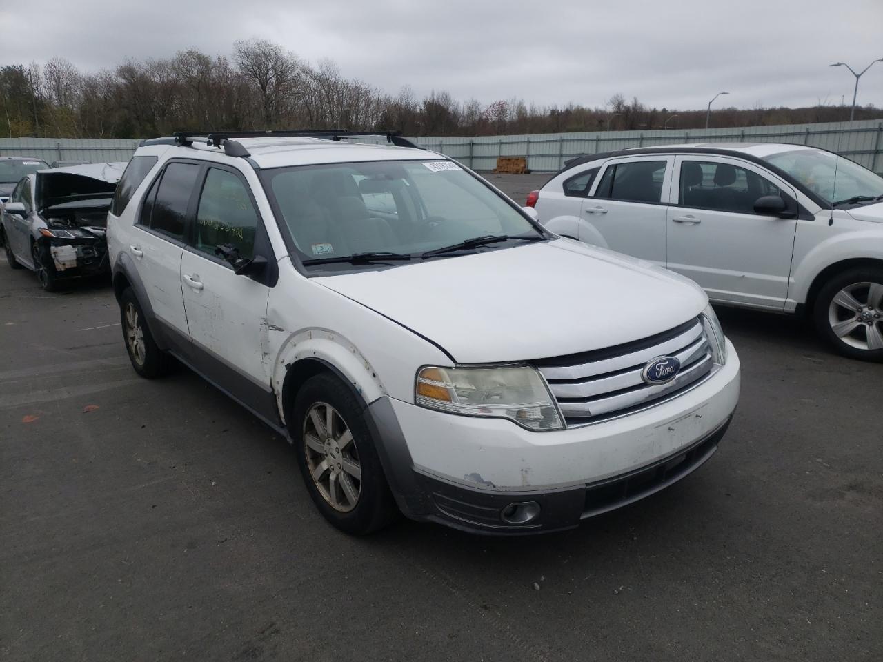 FORD TAURUS X S 2008 with VIN 1FMDK02W28GA27972 - Photo from auction