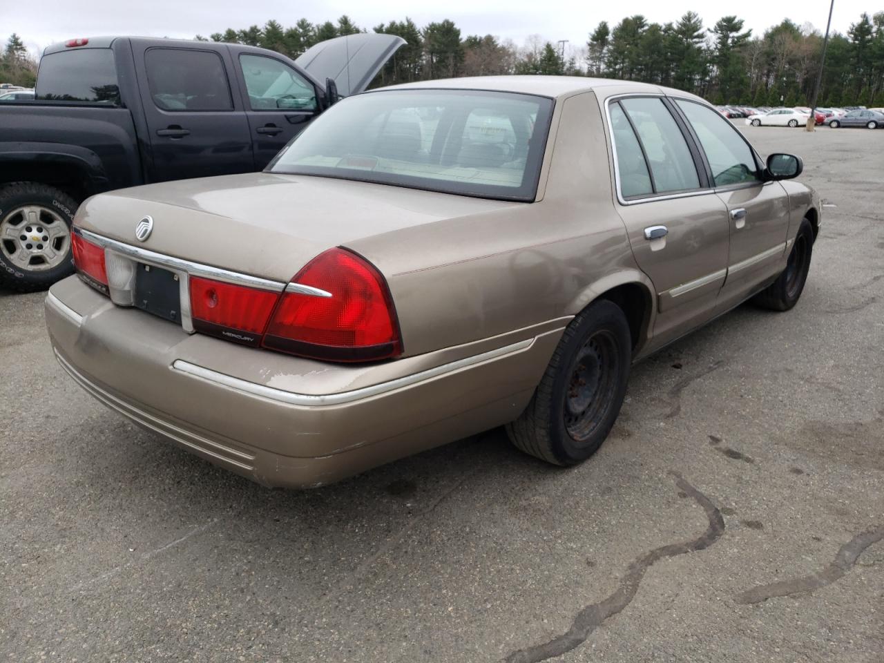 Photo 4 from auction – 2002 MERCURY GRAND MARQ with VIN 2MEFM74W02X647443