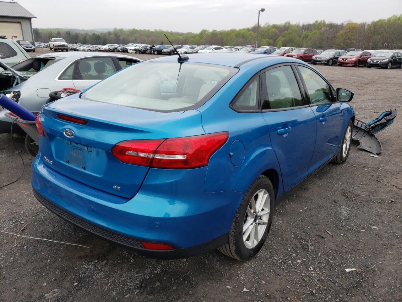 Photo 4 from auction – 2015 FORD FOCUS SE with VIN 1FADP3F24FL285631