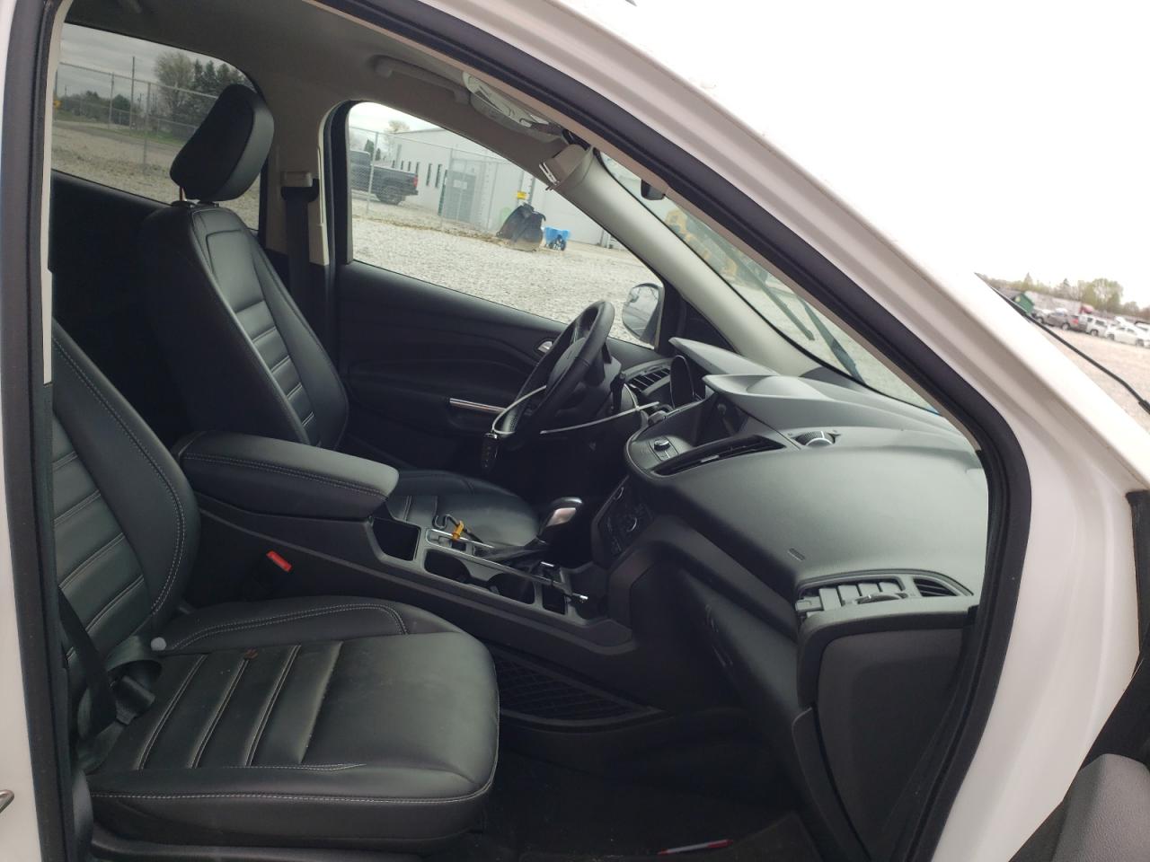 Photo 5 from auction – 2019 FORD ESCAPE SEL with VIN 1FMCU9HD2KUB76746