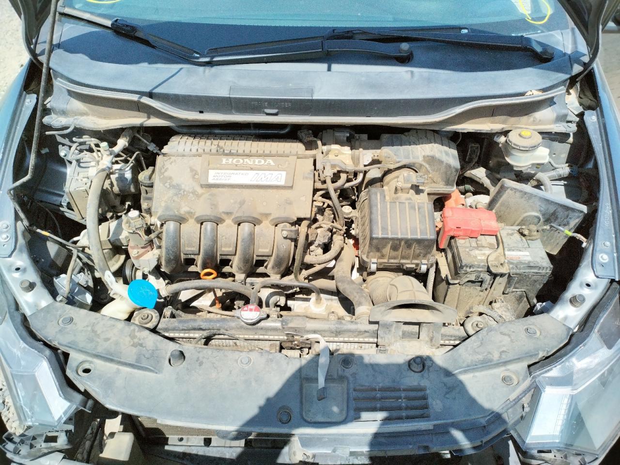 Photo 7 from auction – 2011 HONDA INSIGHT LX with VIN JHMZE2H56BS002586