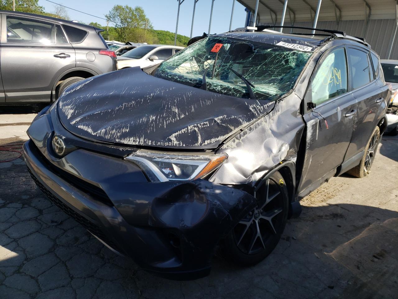 Photo 2 from auction – 2017 TOYOTA RAV4 SE with VIN 2T3JFREV2HW583013