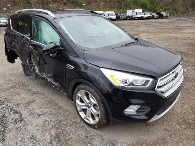 FORD ESCAPE TIT 2017 with VIN 1FMCU9J96HUC70983 - Photo from auction
