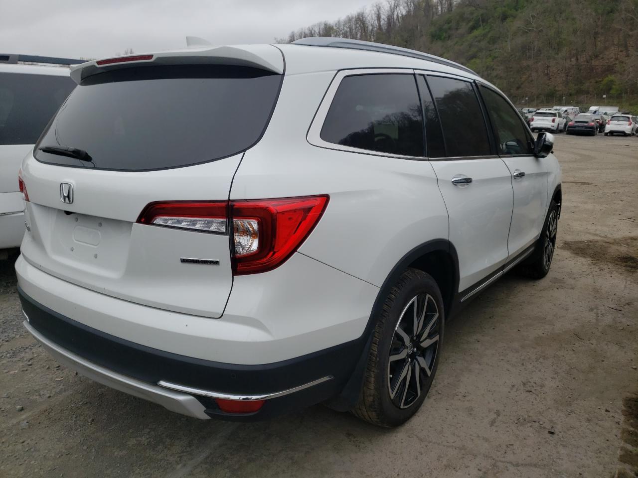 Photo 4 from auction – 2021 HONDA PILOT TOUR with VIN 5FNYF5H64MB011968