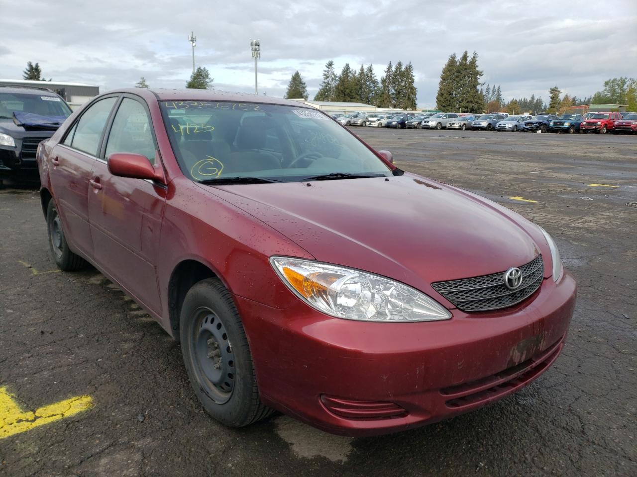 TOYOTA CAMRY LE 2002 with VIN JTDBE32K320131498 - Photo from auction