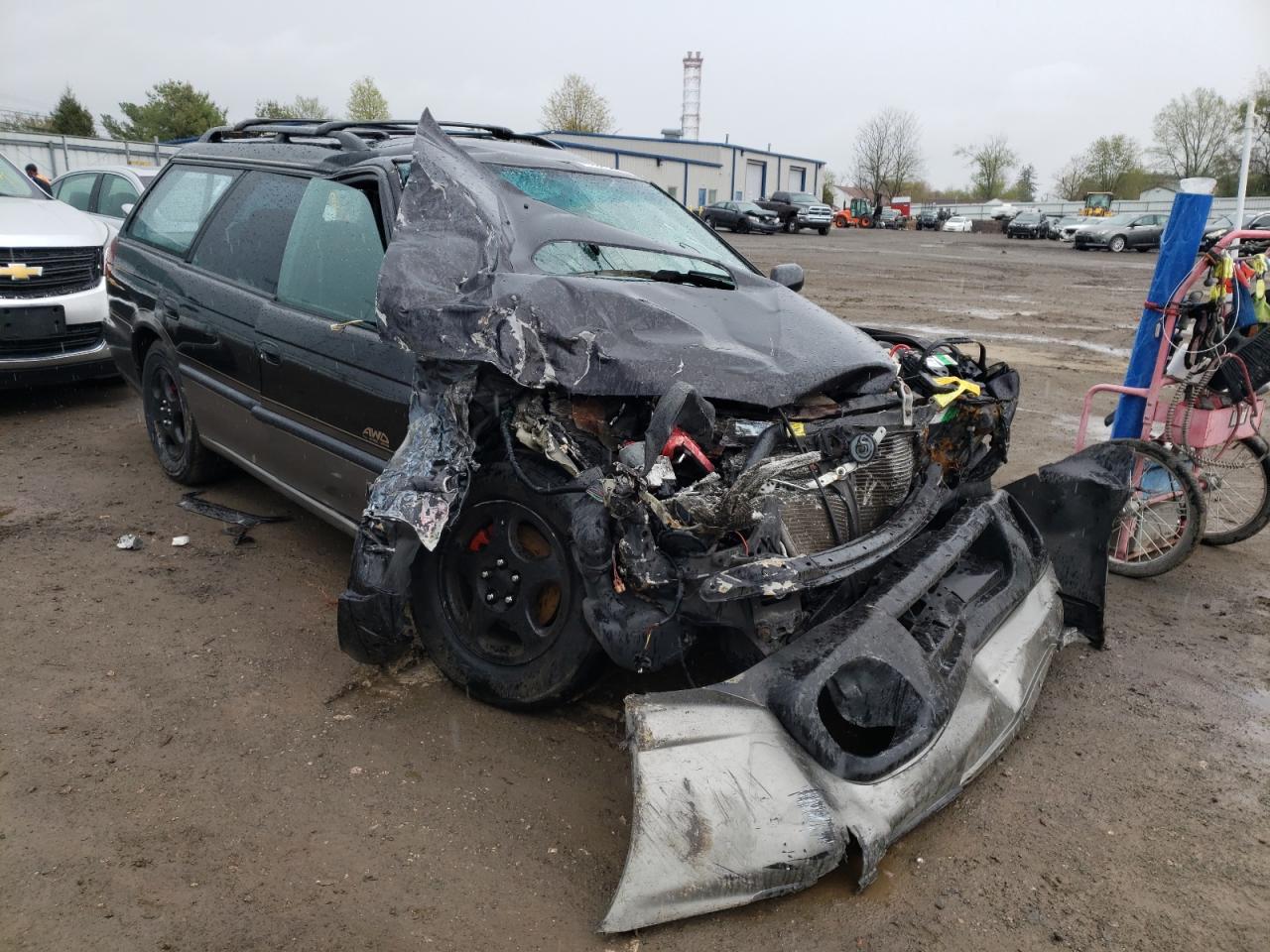 SUBARU LEGACY OUT 1997 with VIN 4S3BG6855V7626164 - Photo from auction