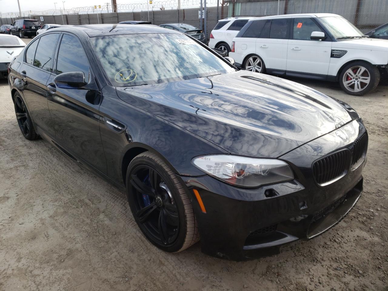 BMW M5 2013 with VIN WBSFV9C53DD095765 - Photo from auction