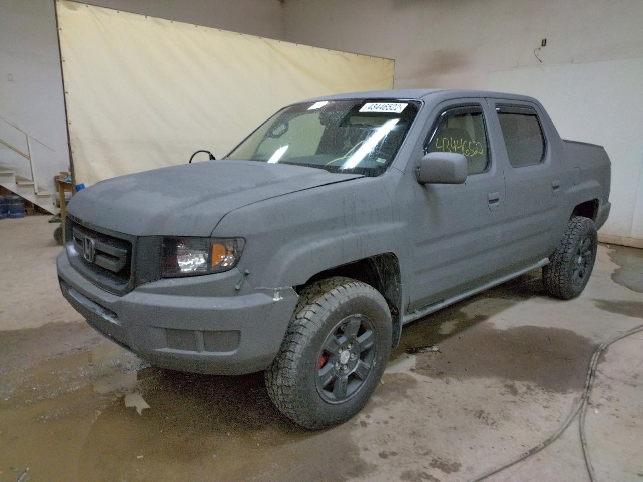 Photo 2 from auction – 2009 HONDA RIDGELINE with VIN 2HJYK16559H003552